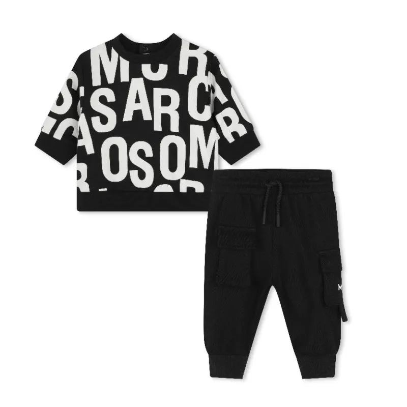 MARC JACOBS Suéter y pantalón